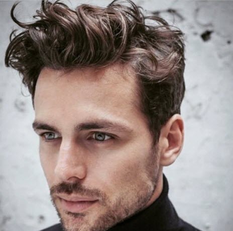 Stylish men's haircut for wavy curly hair